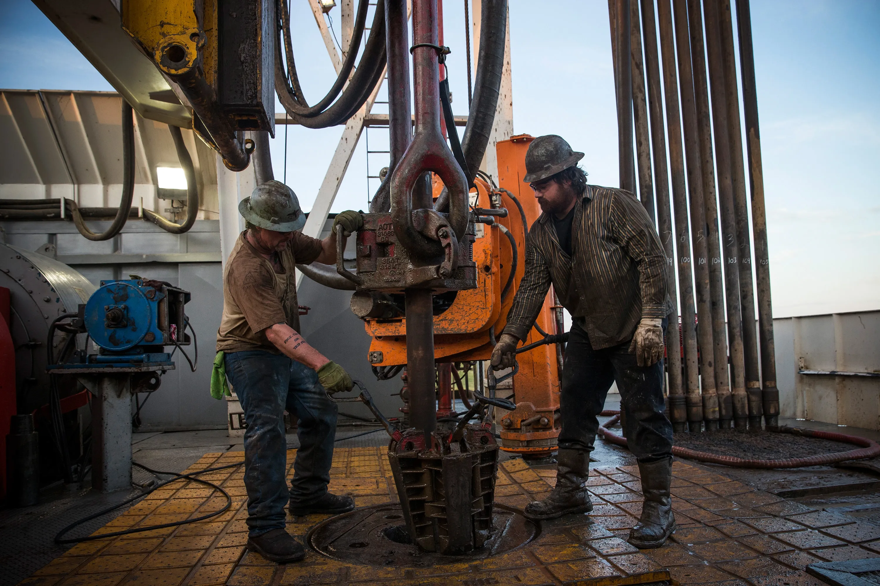 Workers drill for oil outside Watford City, North Dakota.
