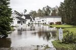 Flood waters surround homes after Hurricane Florence hit Wilmington, North Carolina, in 2018. Worldwide losses from extreme weather events reached more than $3 trillion from 2010 to 2020. 