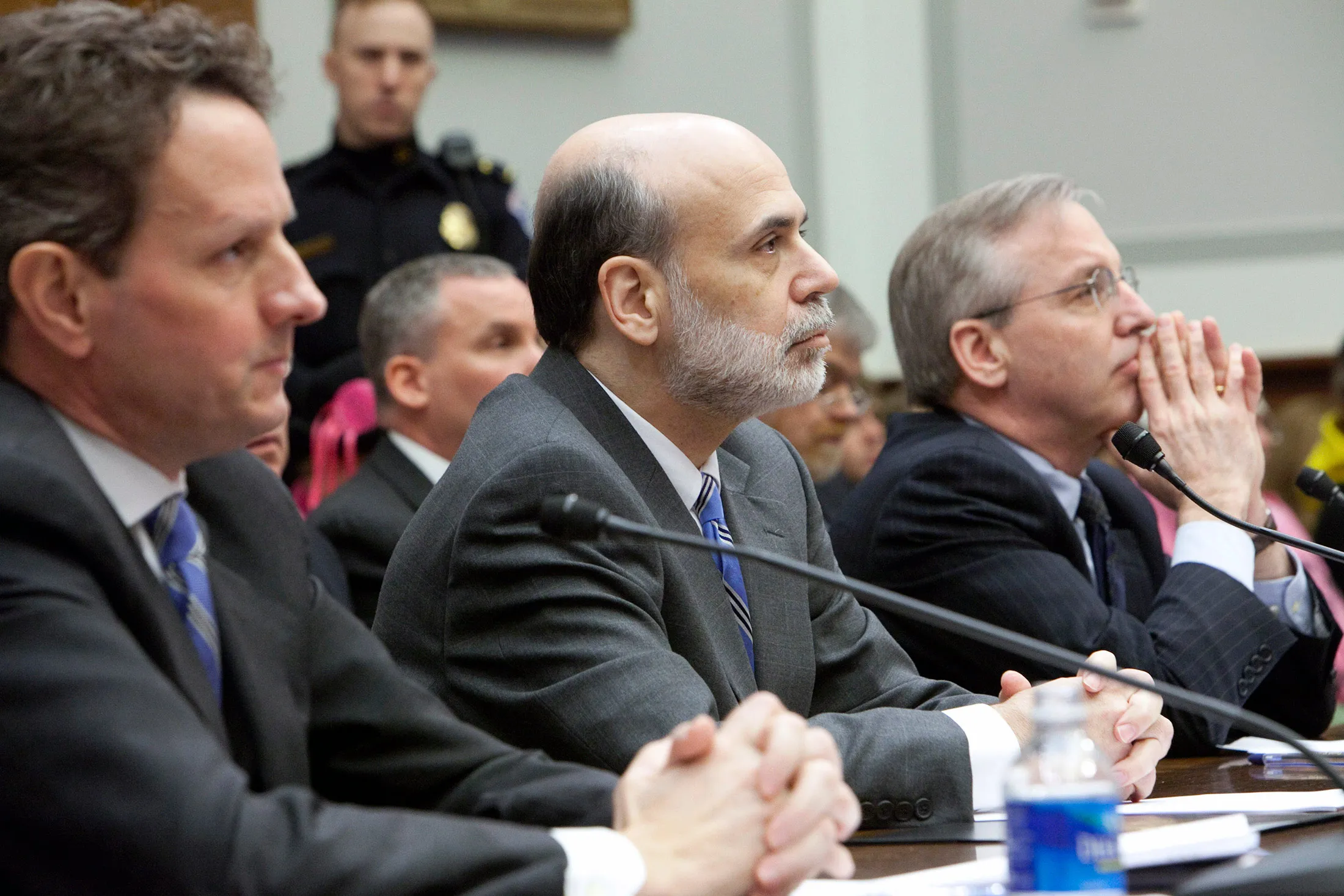 Timothy Geithner, former U.S. treasury secretary, left, Ben S. Bernanke, former chairman of the U.S. Federal Reserve, center, and William Dudley, president of the New York Federal Reserve Bank, testify at a House Financial Services Committee hearing in Washington, D.C., on March 24, 2009.
