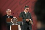 Marcelo Ebrard, Mexico’s foreign minister, right, exits from the podium after speaking during a news conference with Andres Manuel Lopez Obrador, Mexico’s president, at the National Palace in Mexico City, Mexico.