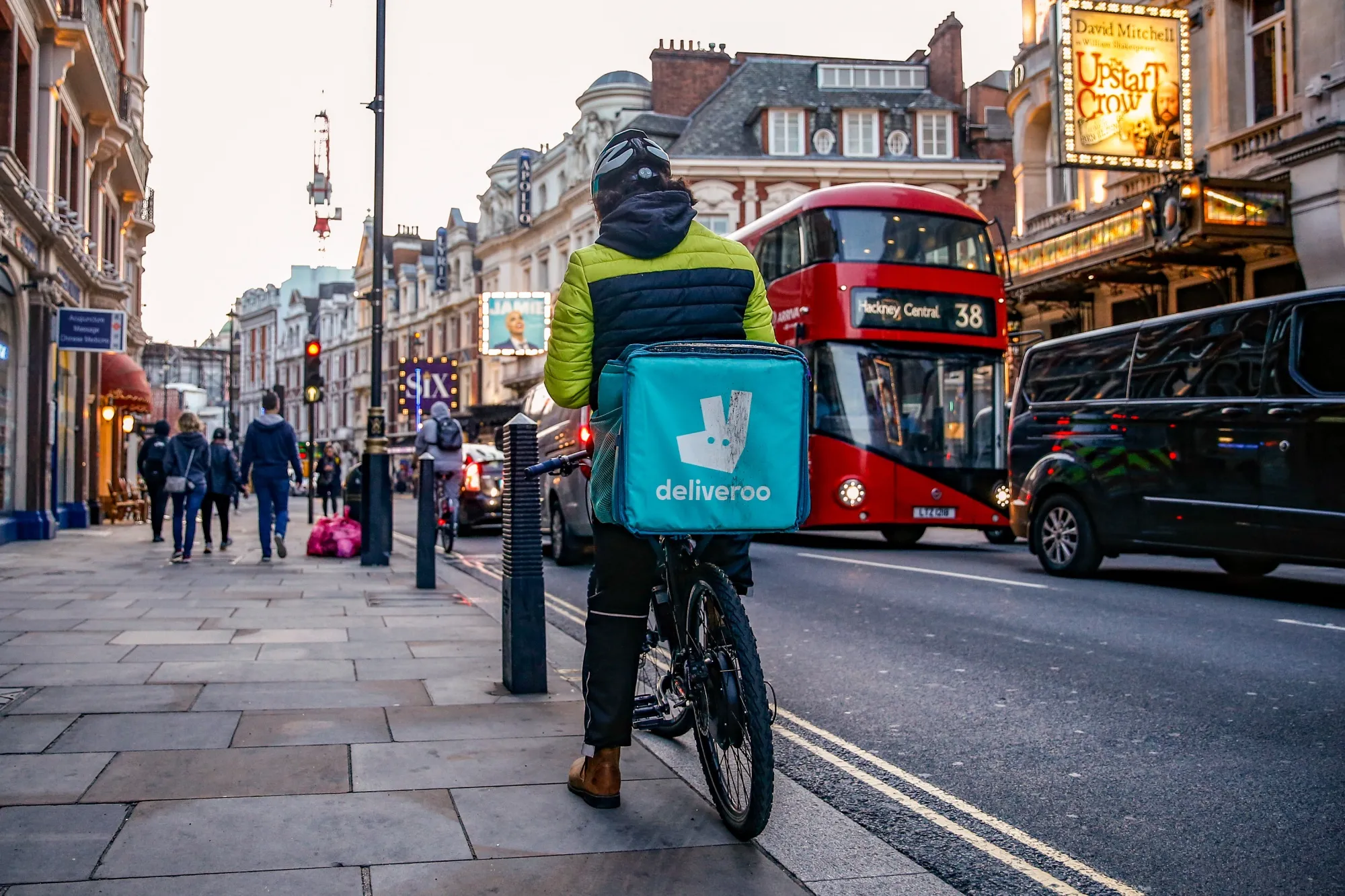 A Deliveroo food courier in London.