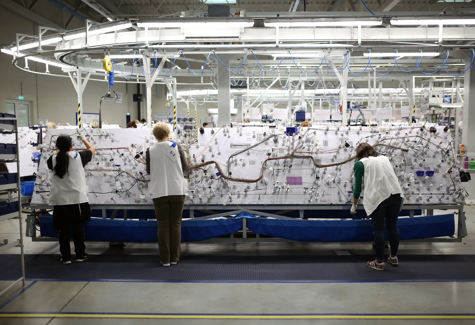 Cable harness assembly at a Leoni factory