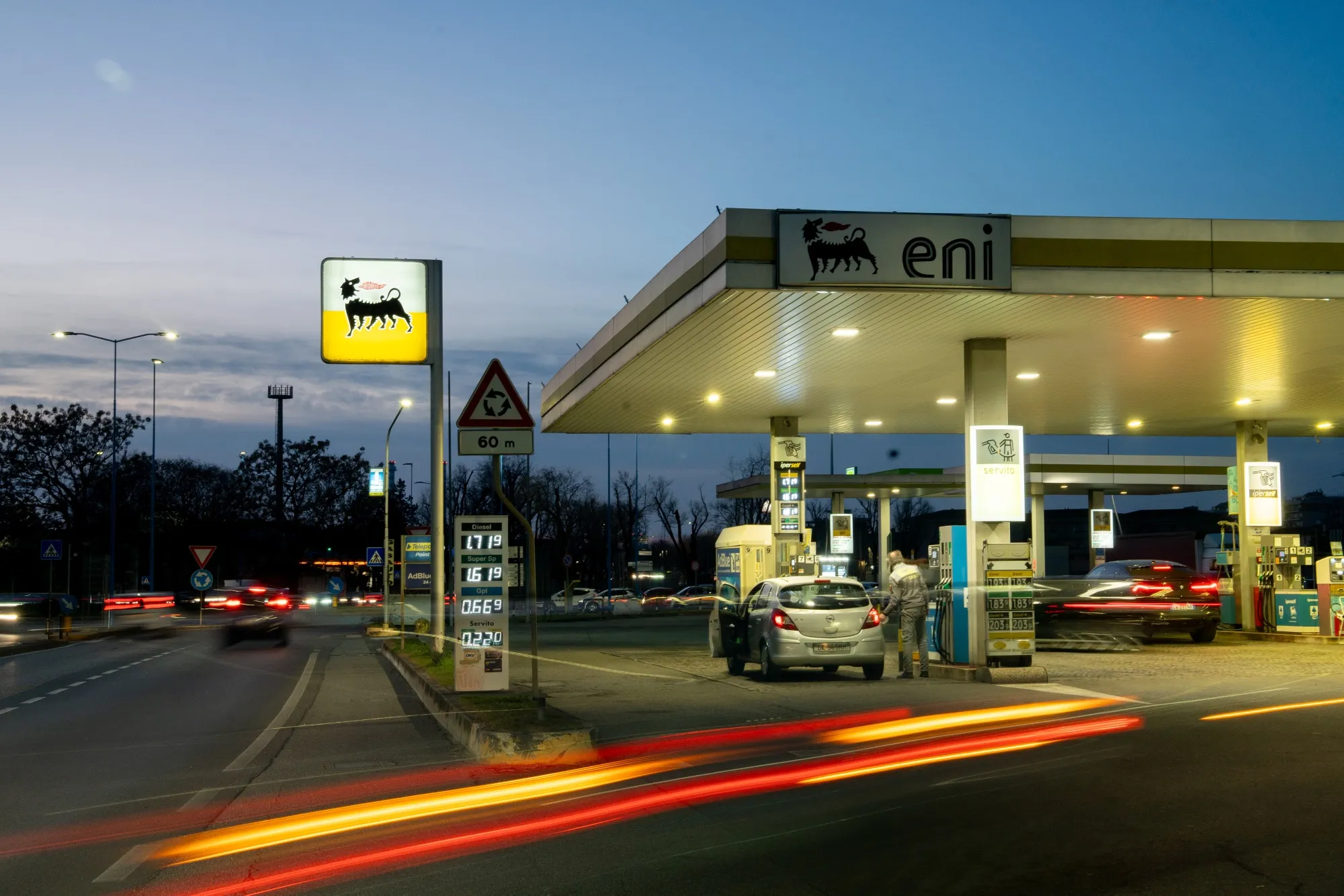Vehicles refuel at a Eni SpA petrol station, in Brescia, Italy.