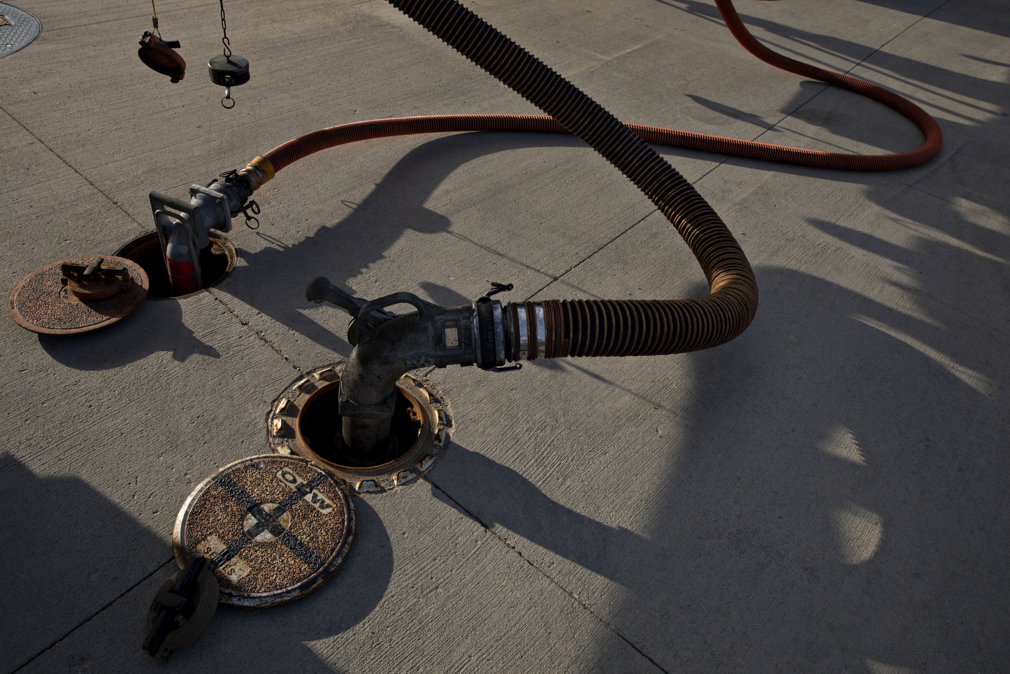 Fuel lines connected to underground storage tanks in Illinois, U.S. Photographer: Bloomberg Creative Photos/Bloomberg