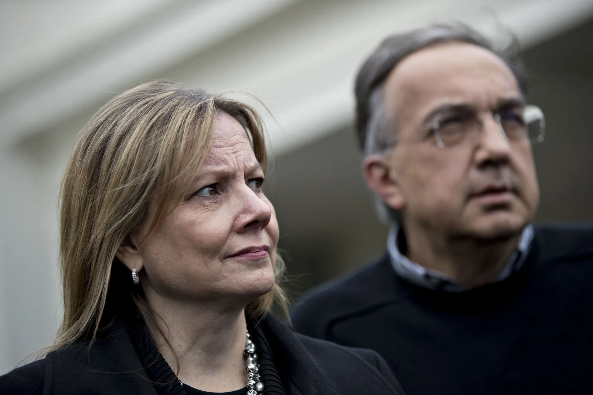 Mary Barra and Sergio Marchionne during a news conference after a meeting with U.S. President Donald Trump on Jan. 24, 2017.