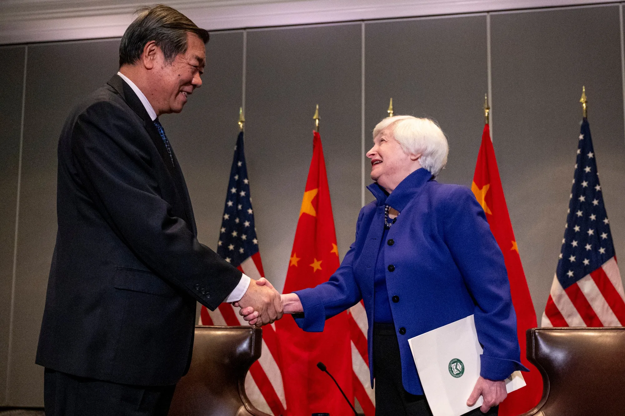 Janet Yellen shakes hands with He Lifeng during a meeting in San Francisco on Nov. 10, 2023. 