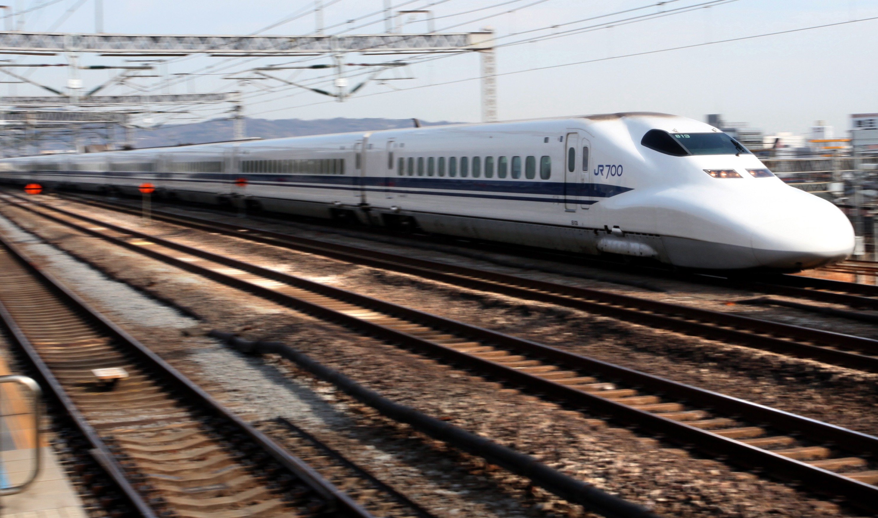 A Central Japan Railway Company&nbsp;Shinkansen bullet train passes through Odawara Station, in Kanagawa Prefecture, Japan, in 2010.