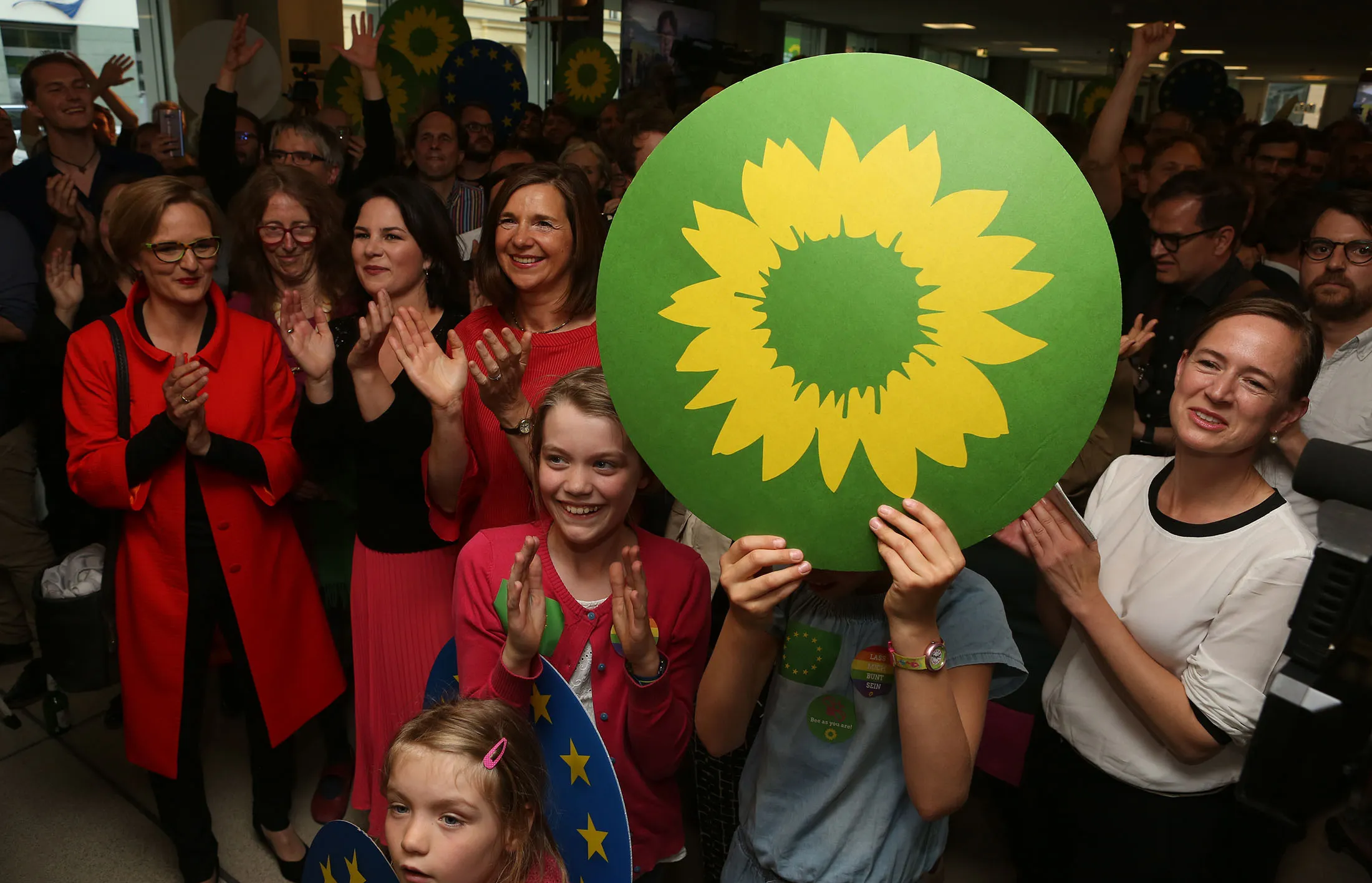 Supporters of the European Green party react to exit poll results in Berlin on May 26.