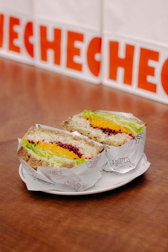 A spicy chickpea salad sandwich, served on house-baked rye bread at Hector’s Deli