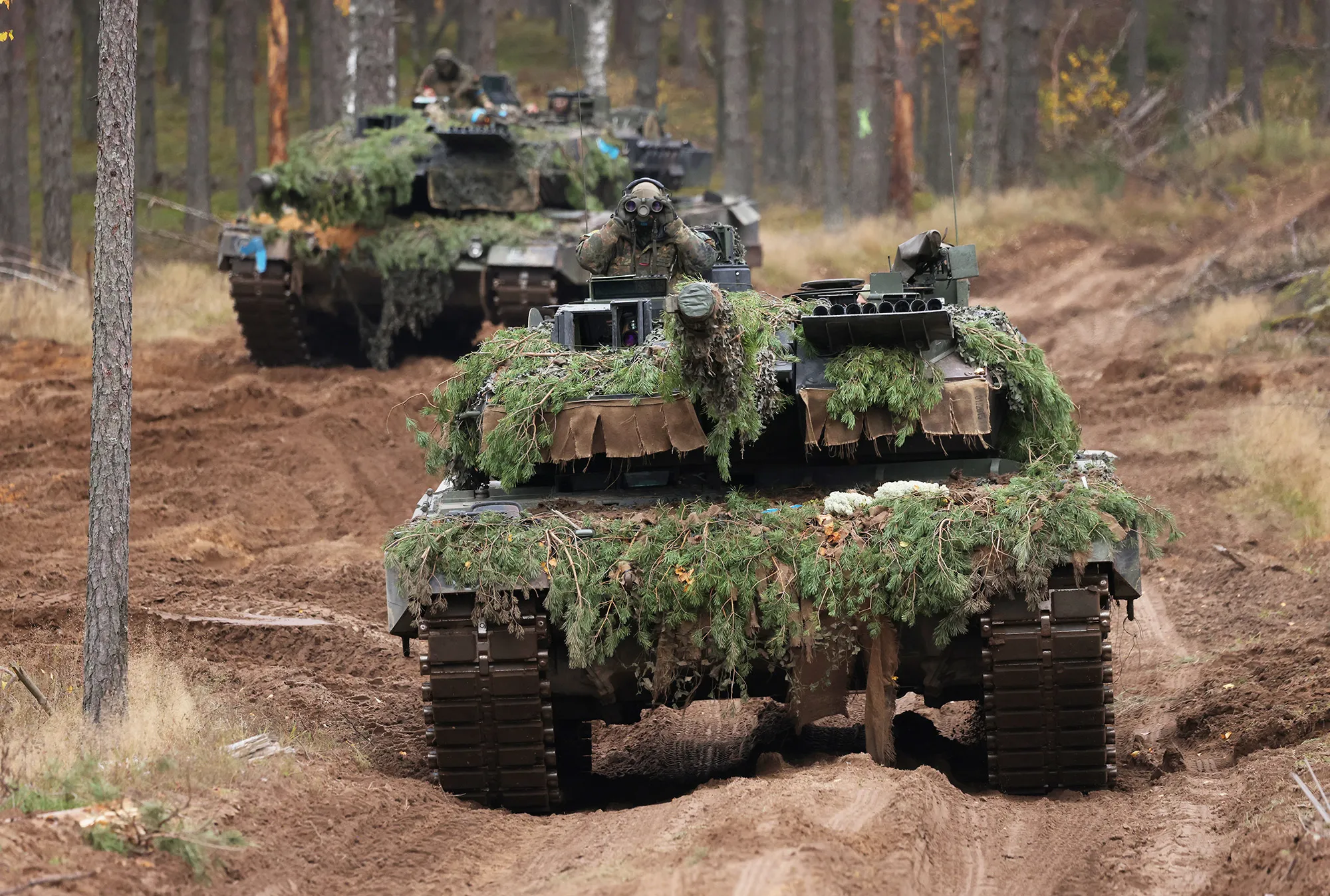 Two Leopard 2A6 main battle tanks.