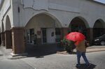 A woman shields herself from the sun,&nbsp;in Calexico, California on June 12.