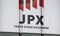 Tokyo Stock Exchange and Stock Boards As Japan Shares Dip With Banks As Volatility Returns to Markets
