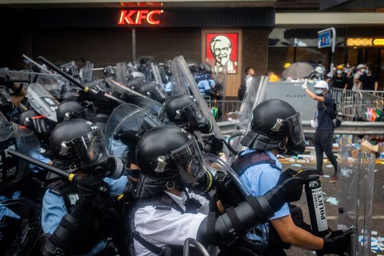 Hong Kong Police Tactics Under Fire as Legislature Resumes