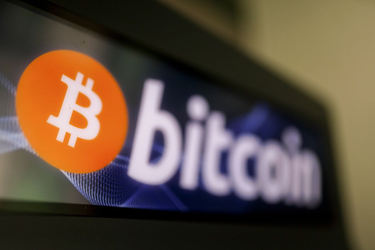 ビットコイン、6万ドル付近－米利下げ期待で値上がり後 - Bloomberg