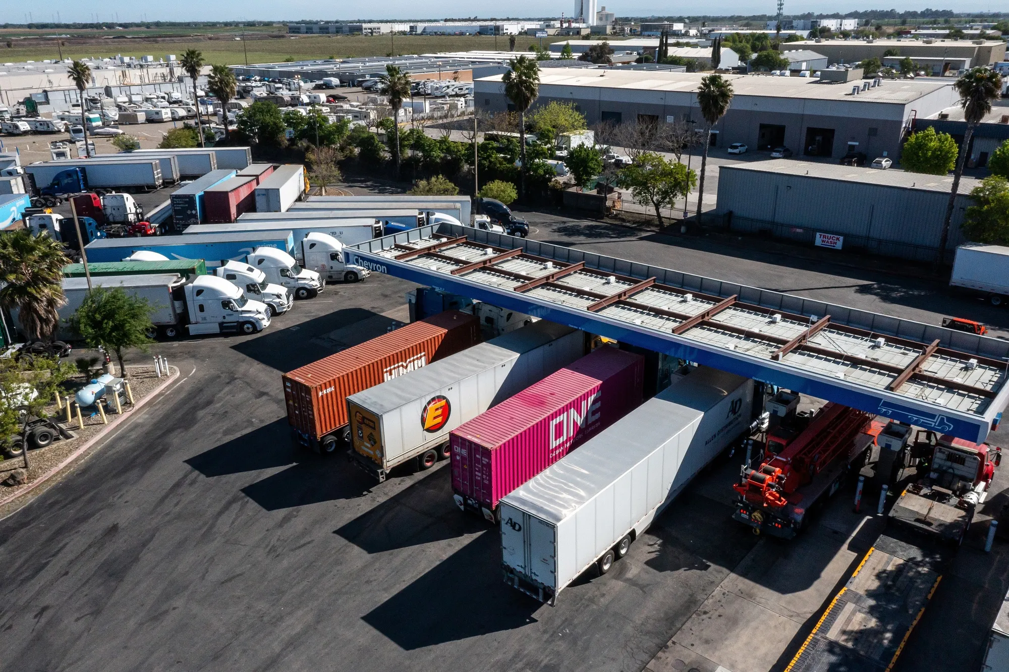 Drivers refuel tractor trailers with diesel fuel at a Chevron truck stop in Tracy, California, US, on Wednesday, March 25, 2026. The average cost for a gallon of diesel in California rose to the highest level ever as the state deals with limited oil-refining capacity and as the war in Iran disrupts global energy shipments.