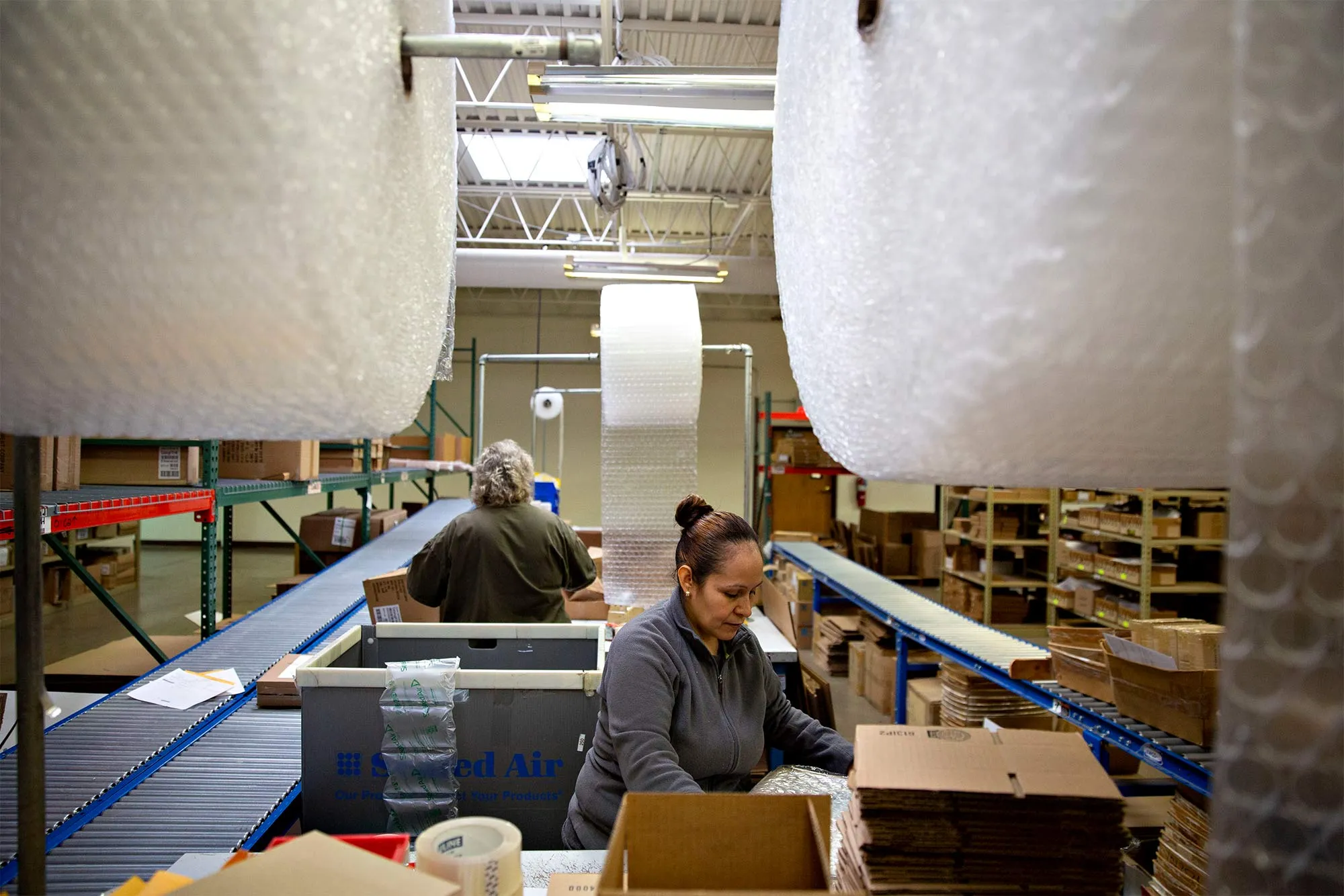 Workers prepare shipments at the Primex Family of Companies.