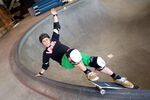 Skateboarding legend Christian Hosoi shows off a layback grind at Vans Skatepark in Orange, Calif., on June 5, 2012