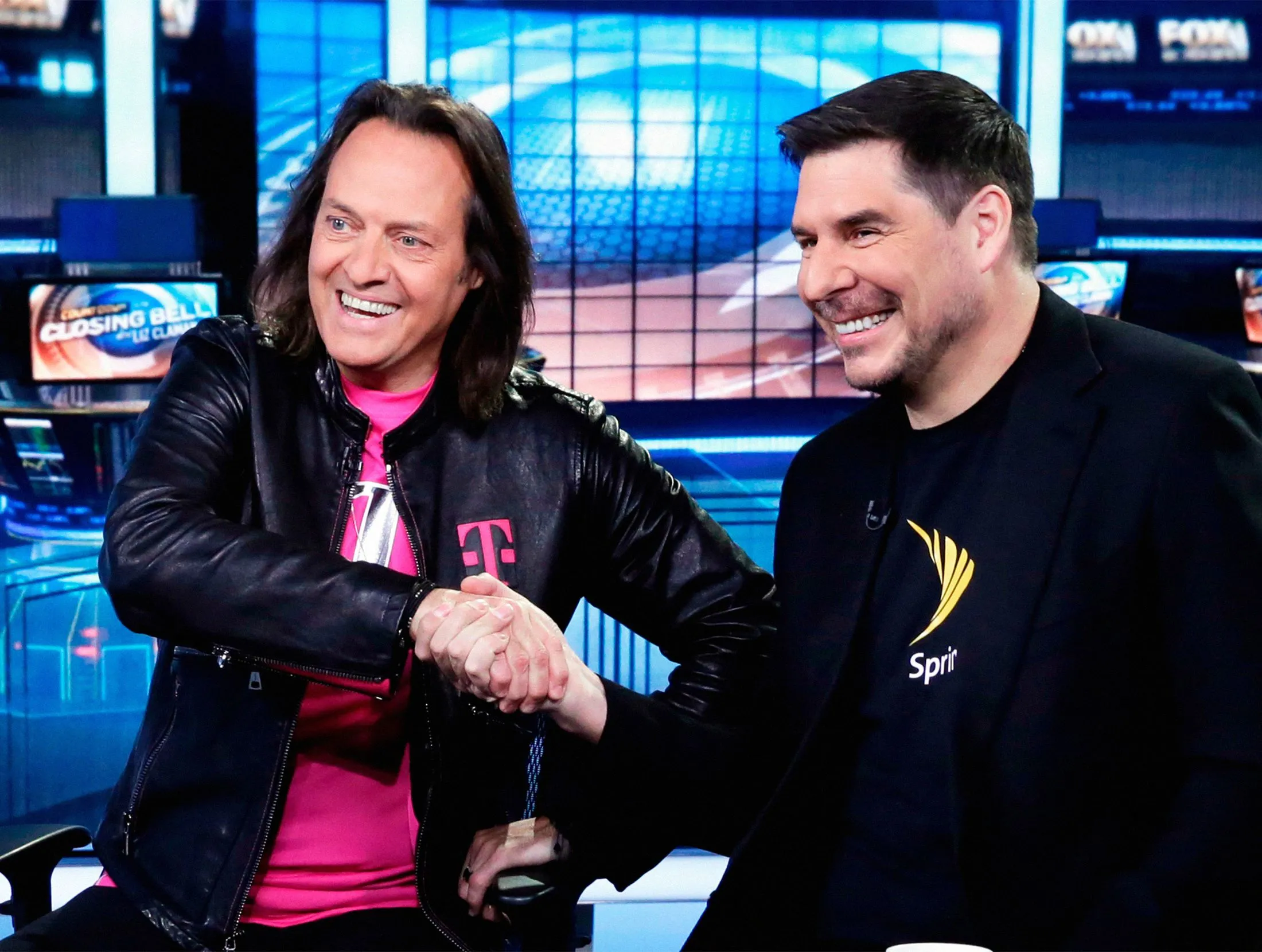 From left, T-Mobile US Inc. Chief Executive Officer John Legere and Sprint Corp. CEO Marcelo Claure&nbsp;during an interview on Fox Business Network on April 30, 2018.