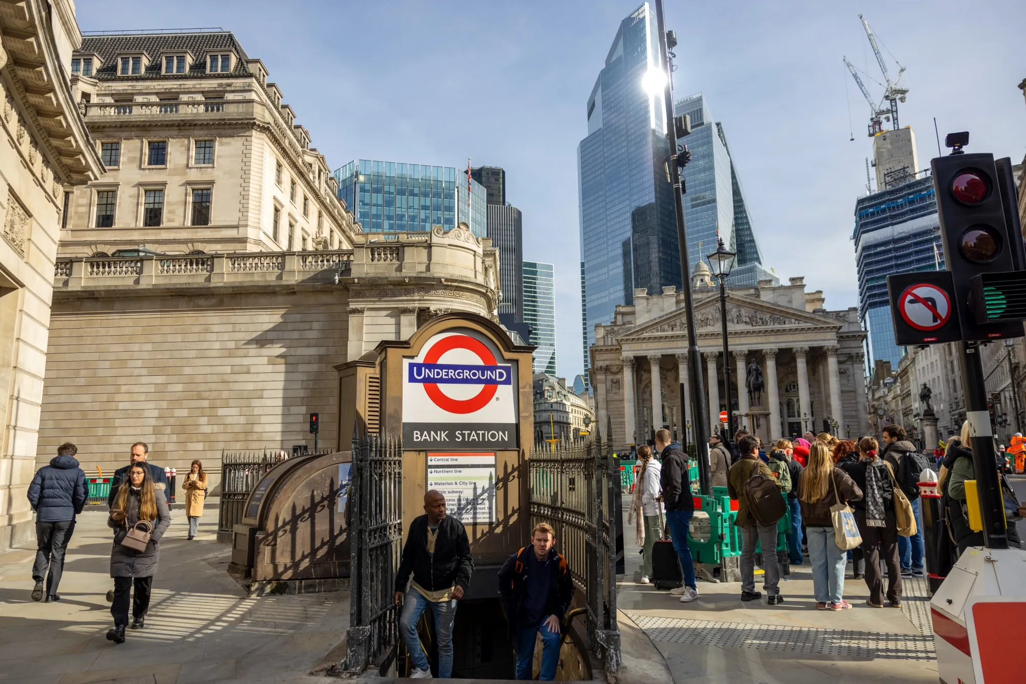 Pedestrians at the Bank London Underground station in the City of London, UK.