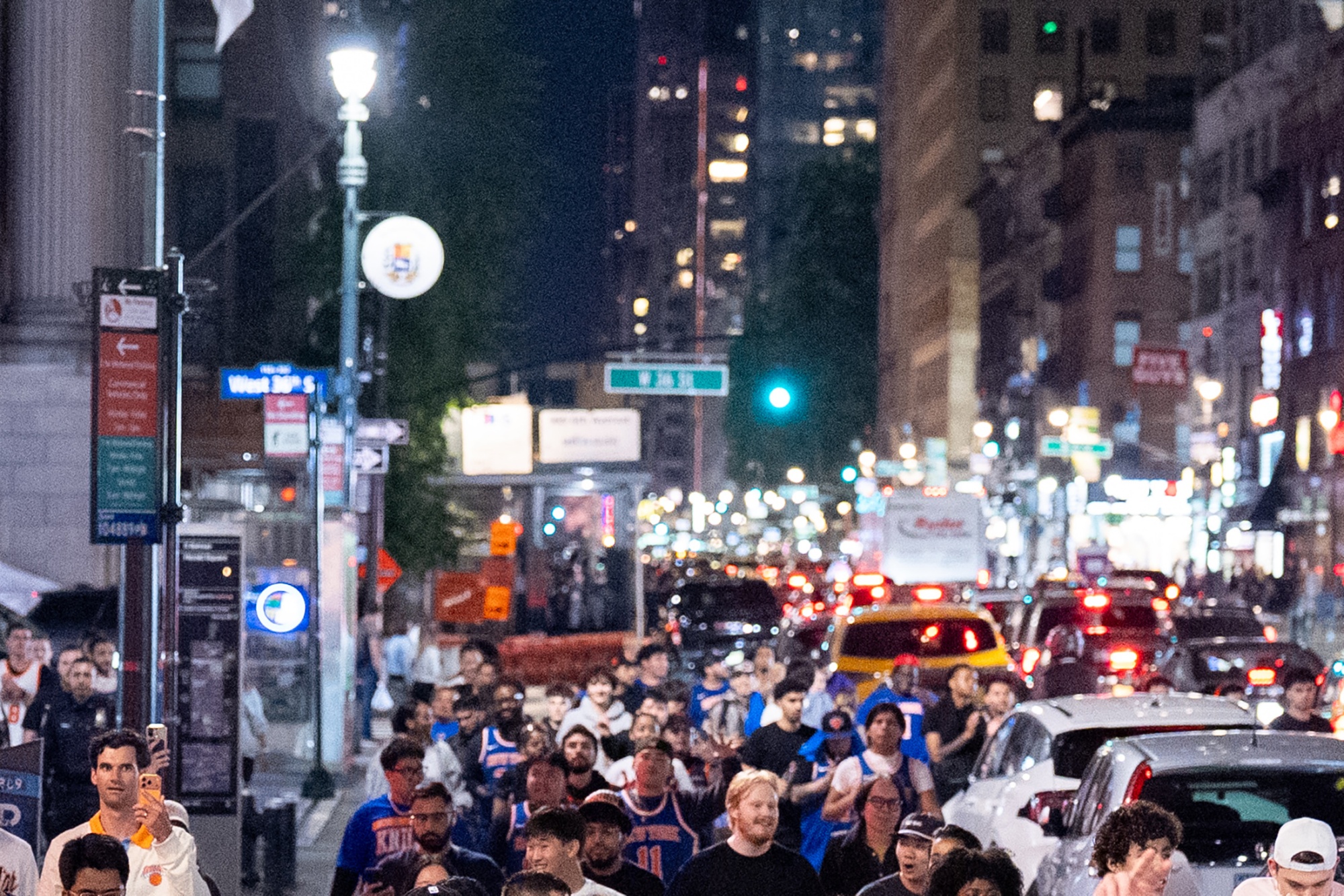Knicks fans celebrate winning the Eastern Conference Finals against the Cleveland Cavaliers in New York City on May 25.