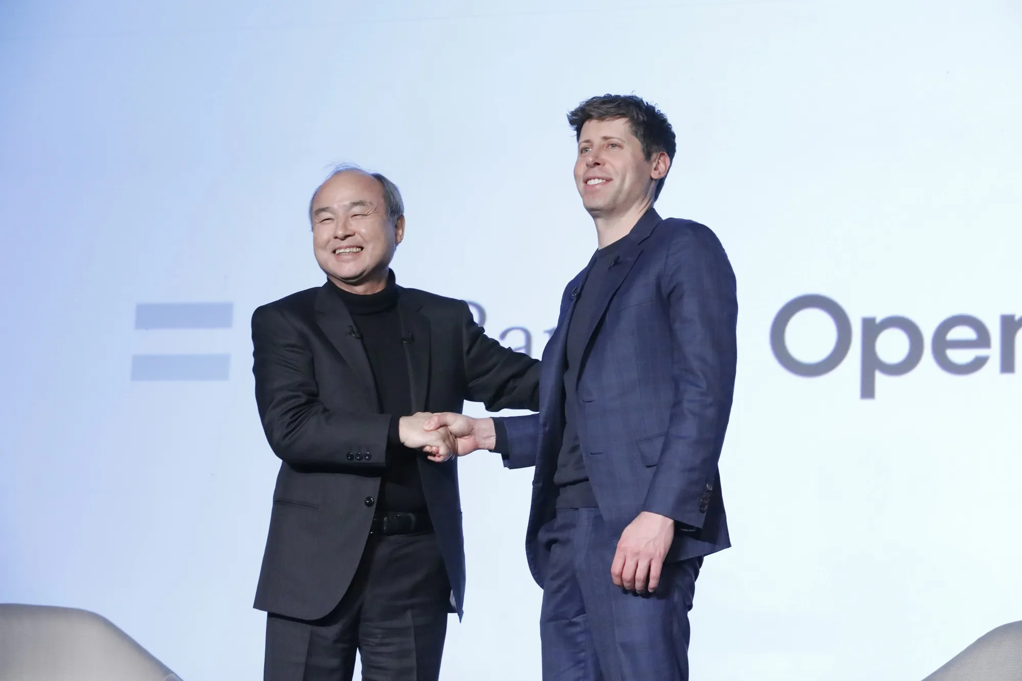 Sam Altman, right, with Masayoshi Son in Tokyo on Feb. 3.