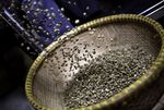 Green robusta coffee beans are sorted at a processing plant in Ho Chi Minh City, Vietnam.