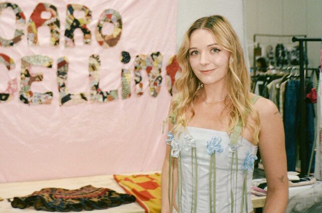 Liz Stevenson wears clothing made from old handkerchiefs and vintage napkins