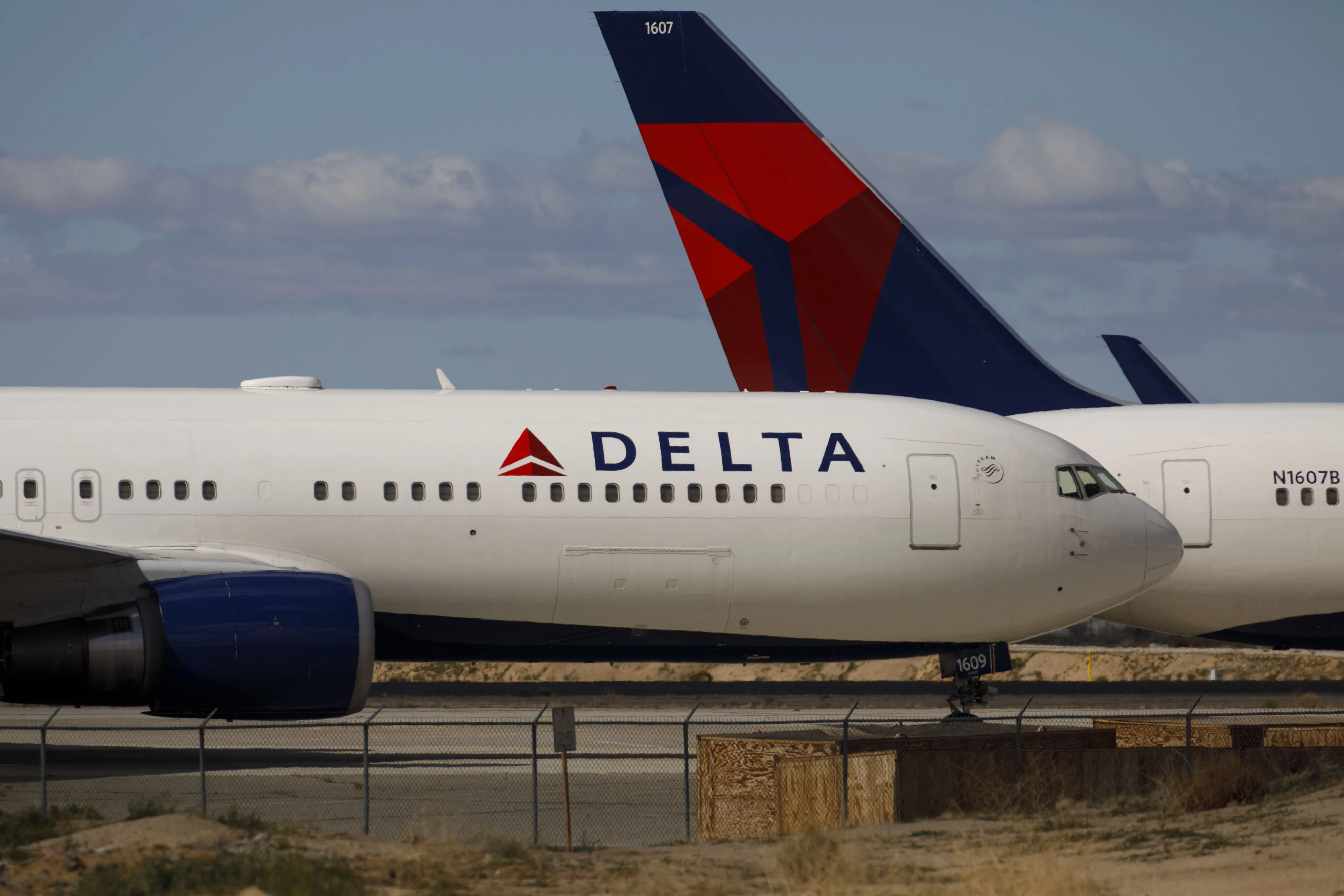 Delta Air Lines Inc. aircraft sit parked at a field in Victorville, California.