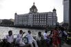 India Cuts Tax On Goods And Services After $20 Billion Stimulus