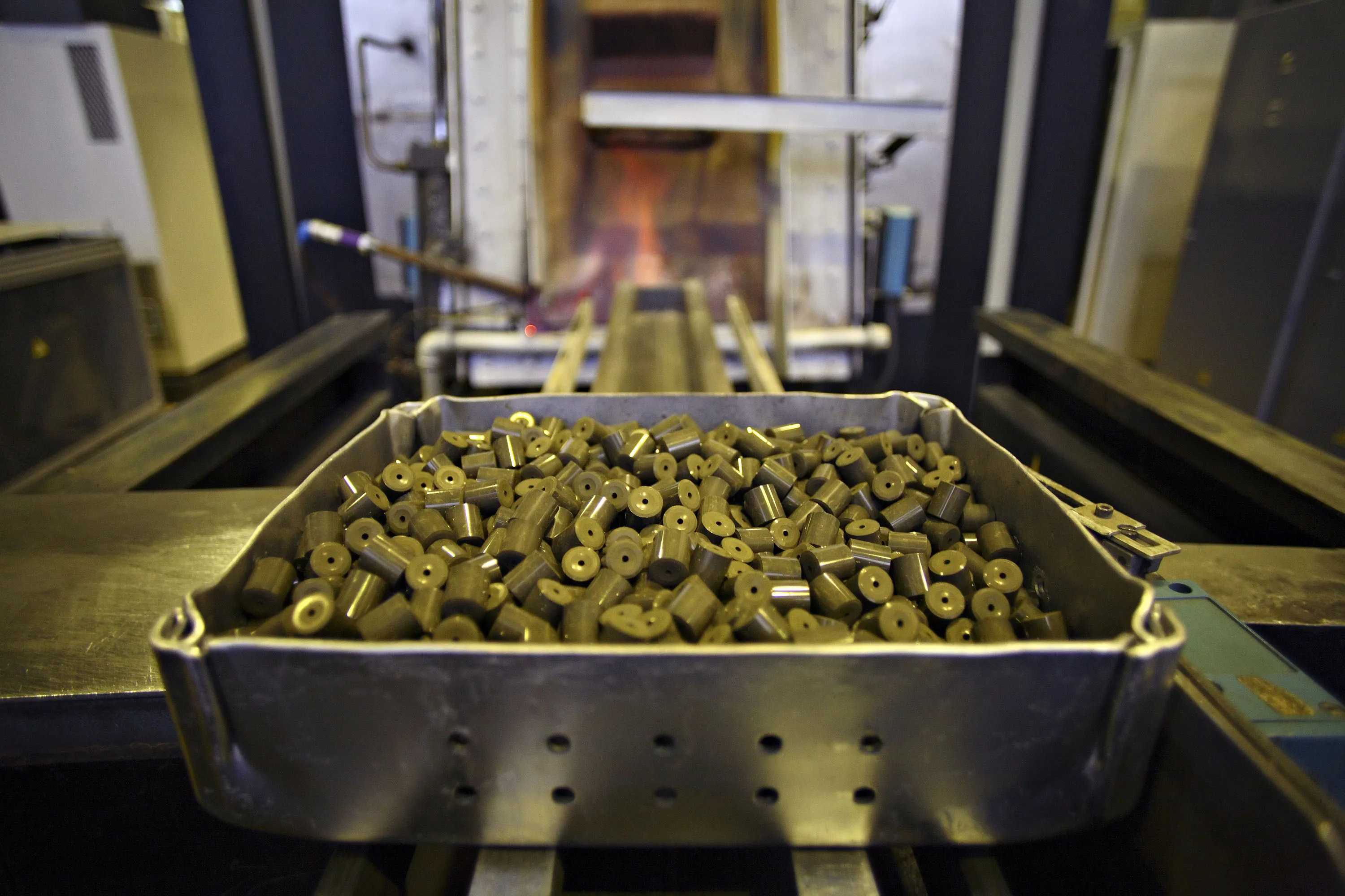 A tray of uranium pellets.