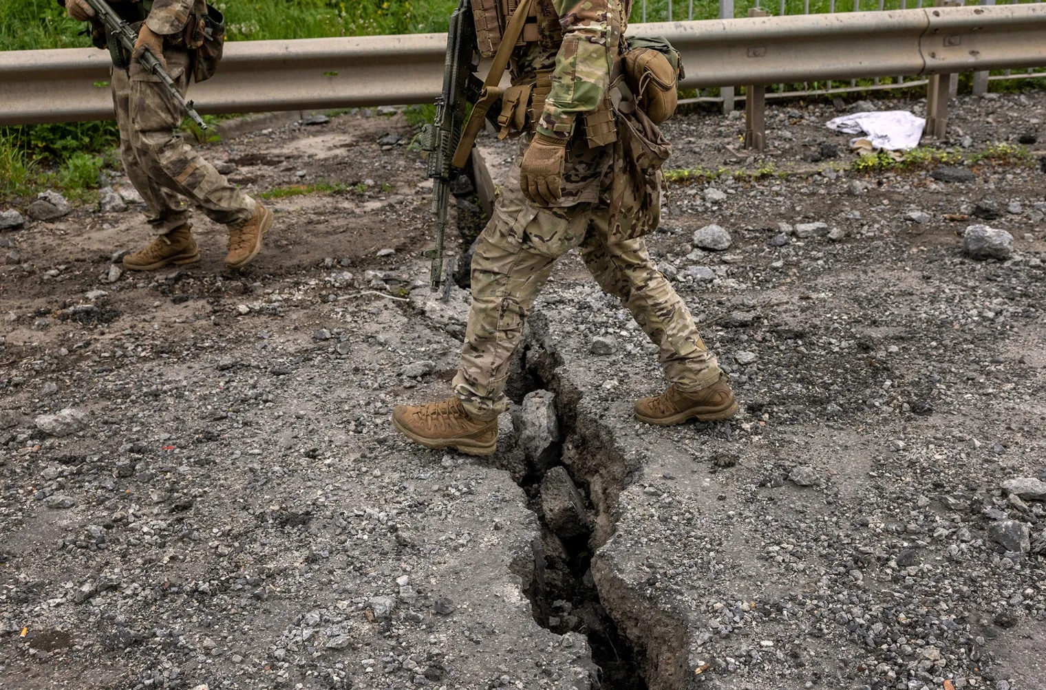 Ukrainian Territorial Defense soldiers patrol near the frontline near Ruska Lozova, Ukraine on May 22.&nbsp;