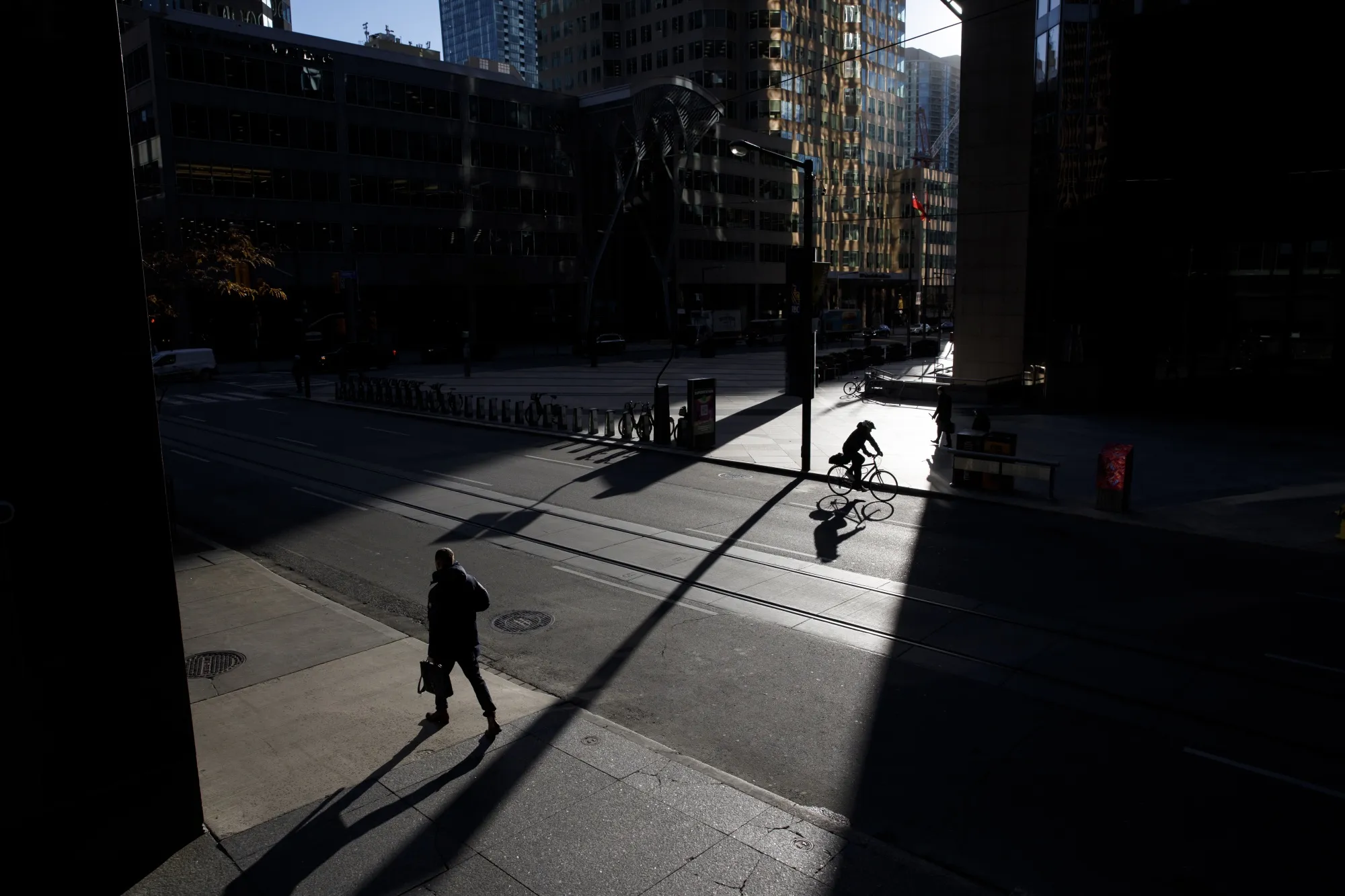 Commuters outside the TD Tower in the financial district of Toronto, Ontario.