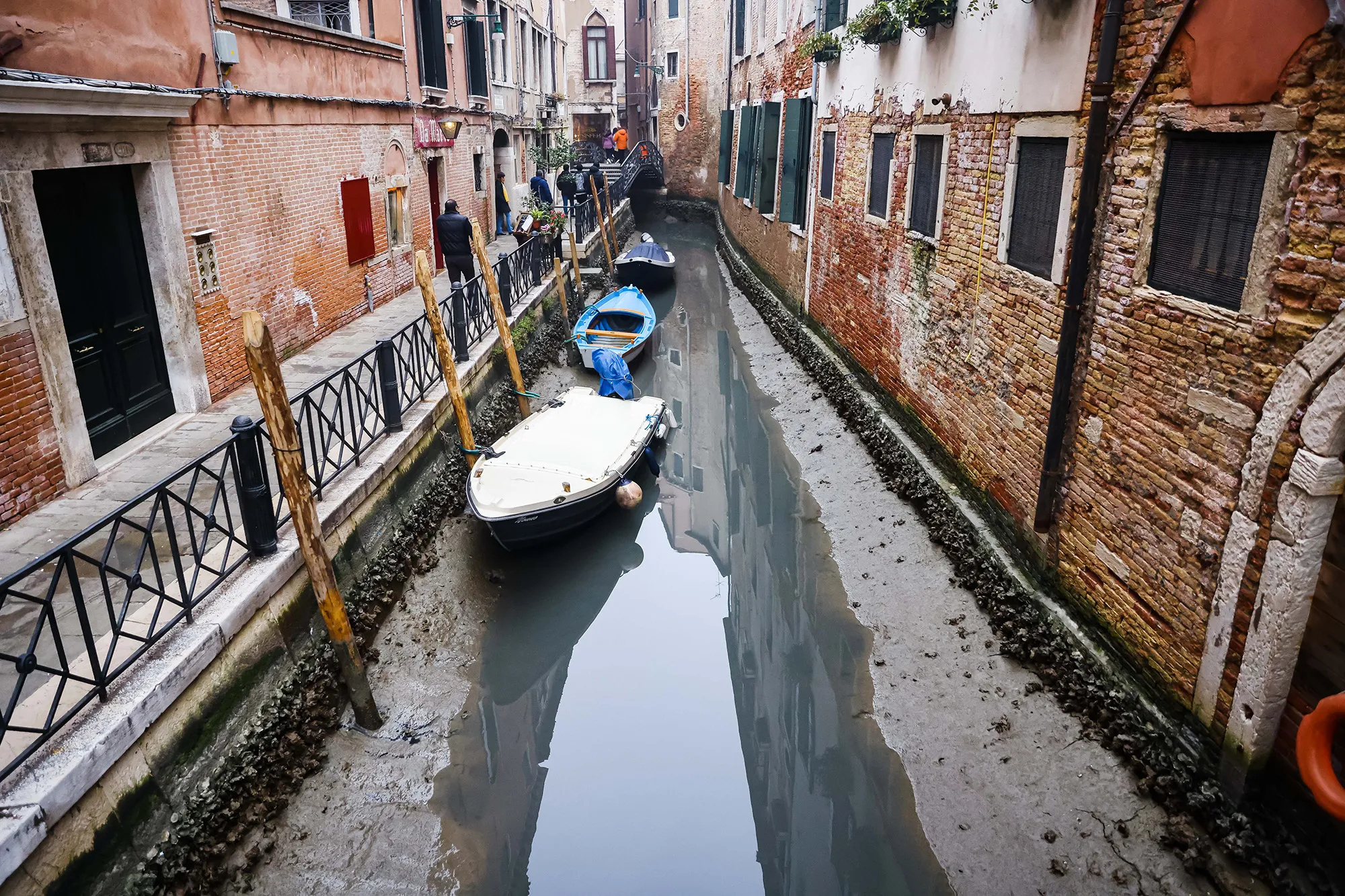 A dry canal following&nbsp;low tide, in Venice, Feb 16.