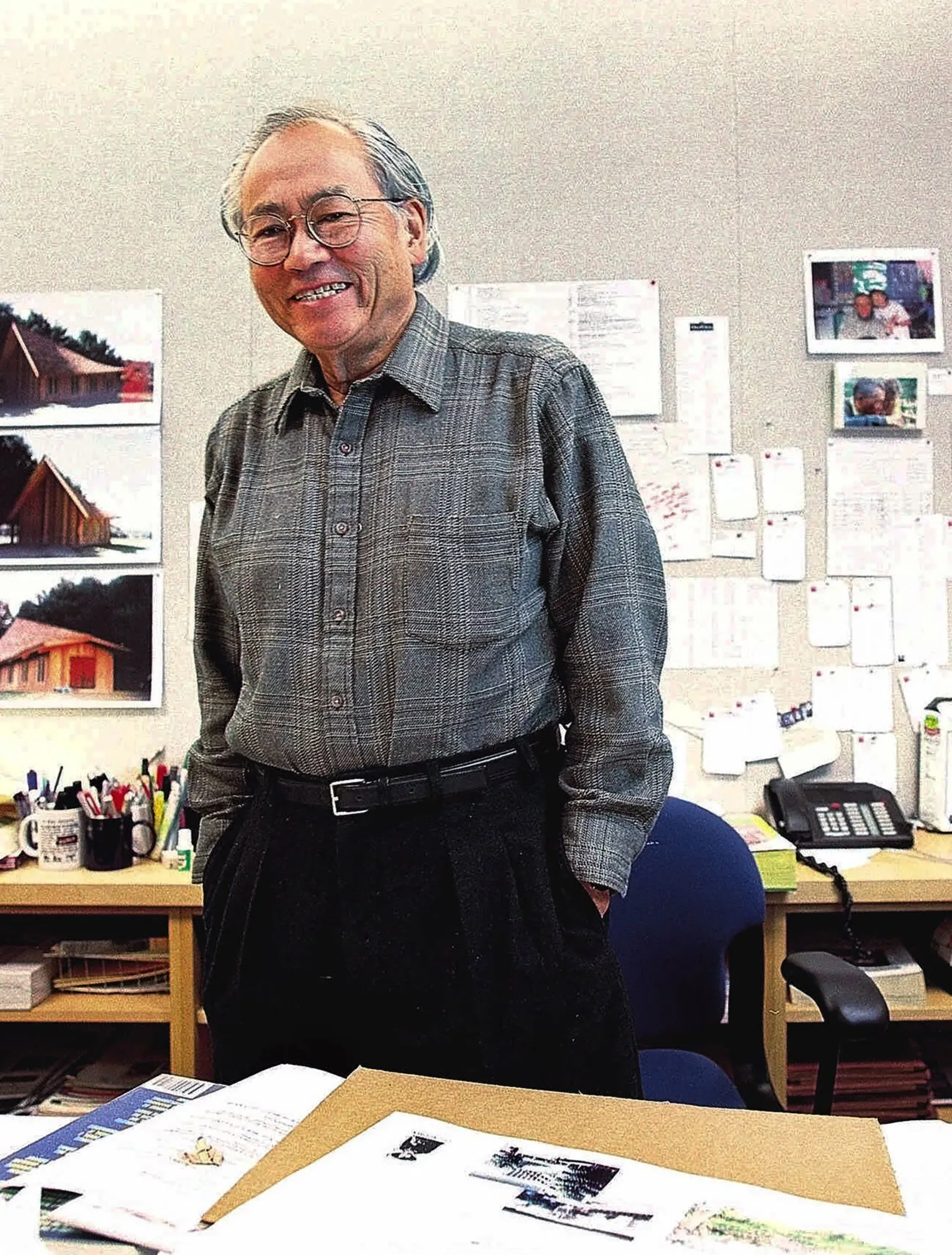 Gyo Obata, poses for a photo in his St. Louis, Mo. office, Dec. 18, 1998. Obata, an architect whose designs included sports and entertainment arenas, airports and a presidential library, has died. His family says Obata died Tuesday, March 8, 2022 in St. Louis at age 99. A cause of death was not announced. (Rich Saal/The State Journal-Register via AP)