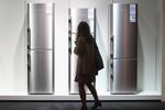 BERLIN, GERMANY - SEPTEMBER 02: A visitor looks at the latest generation of refrigerators at the Liebherr stand at the IFA 2011 consumer electonics and appliances trade fair on the first day of the fair's official opening on September 2, 2011 in Berlin, Germany. The IFA 2011 will be open to the public from September 2-7. (Photo by Sean Gallup/Getty Images)