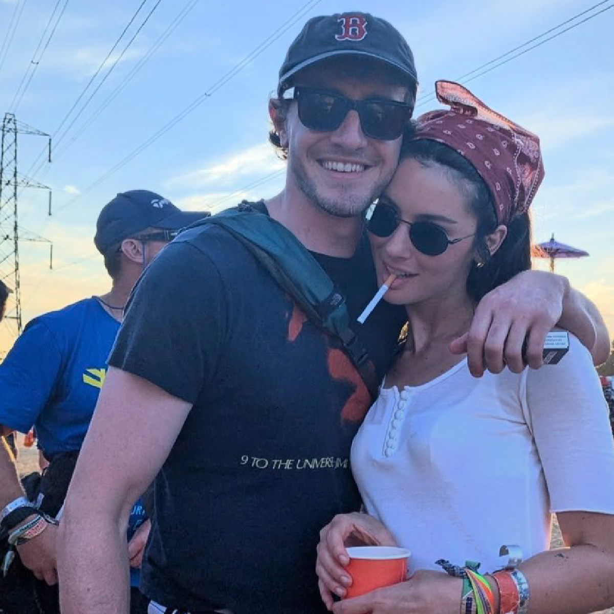 Paul Mescal and Gracie Abrams smoking at Glastonbury.