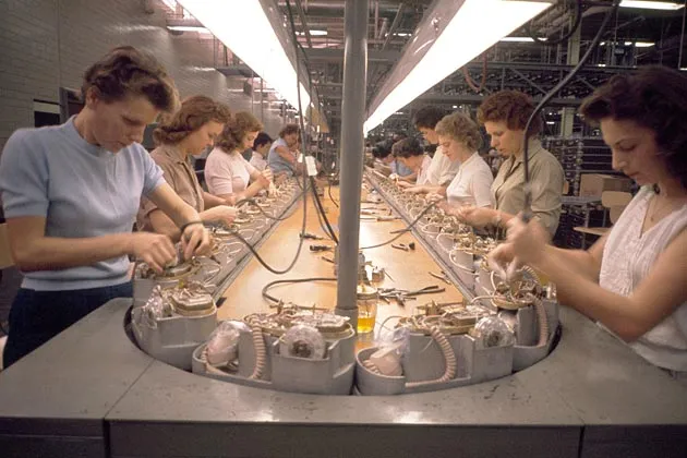 Women build Princess telephones in a factory assembly line in Indianapolis in 1961