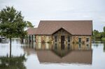 Flood water surrounds a home following Tropical Storm Imelda in Fannett, Texas, U.S., on Friday, Sept. 20, 2019.&nbsp;