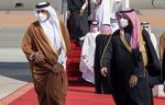 Prince Mohammed bin Salman, right, welcomes Qatar's Sheikh Tamim bin Hamad al-Thani in Al Ula, Saudi Arabia on Jan. 5.