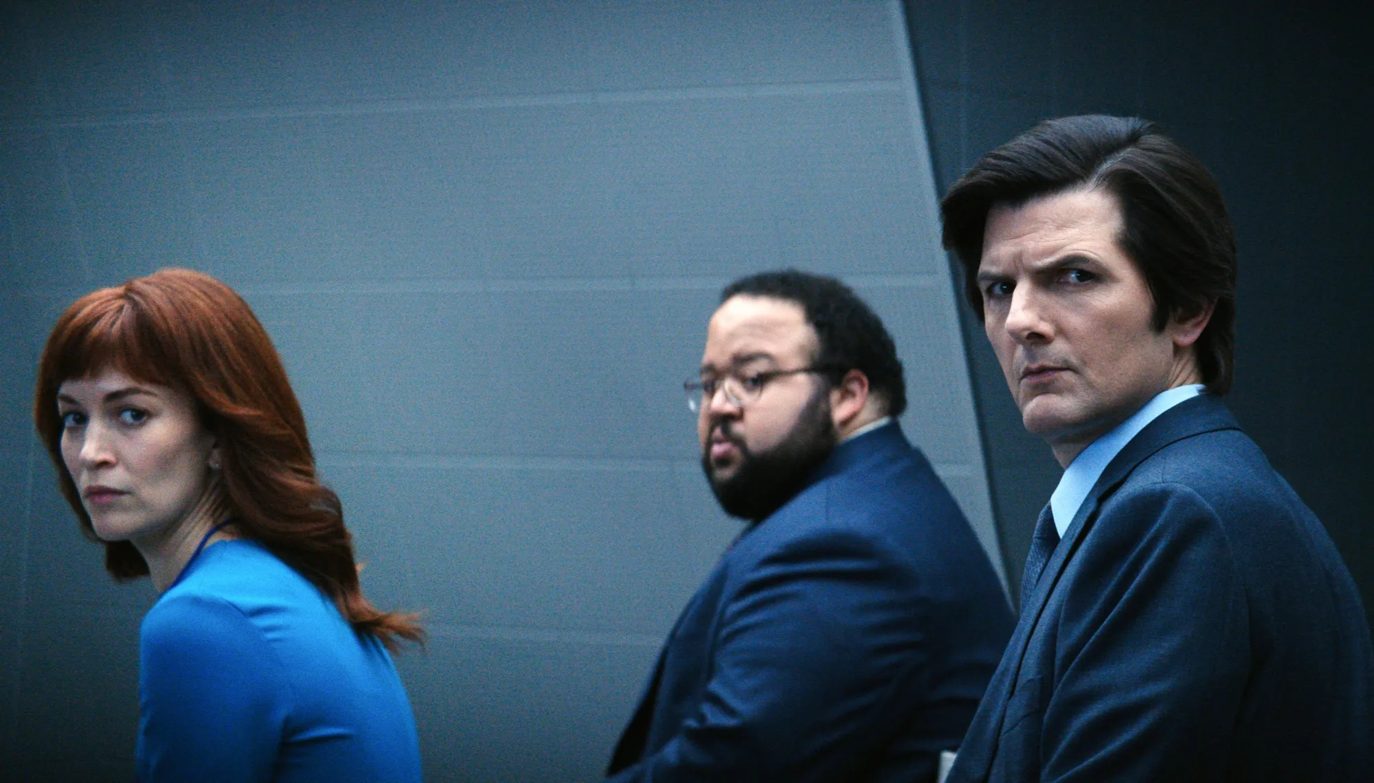 Britt Lower, from left, Zach Cherry, and Adam Scott in a scene from Severance.