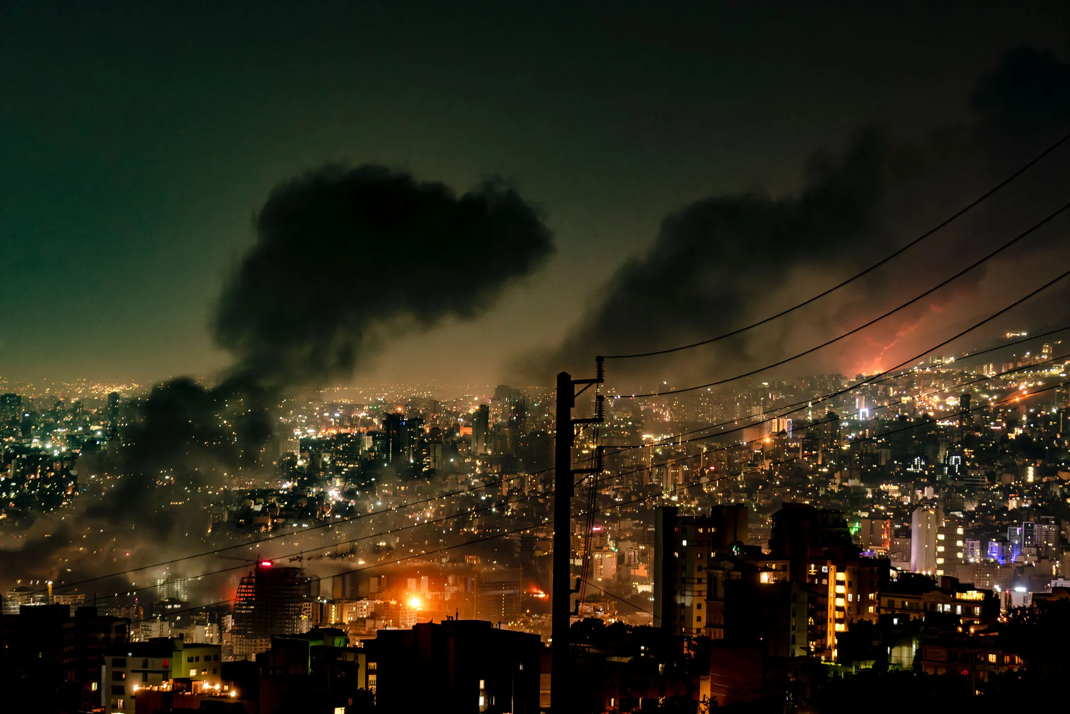 Smoke rises following Israeli strikes in Tehran on June 15.