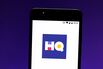 In this photo illustration an HQ Trivia logo seen displayed