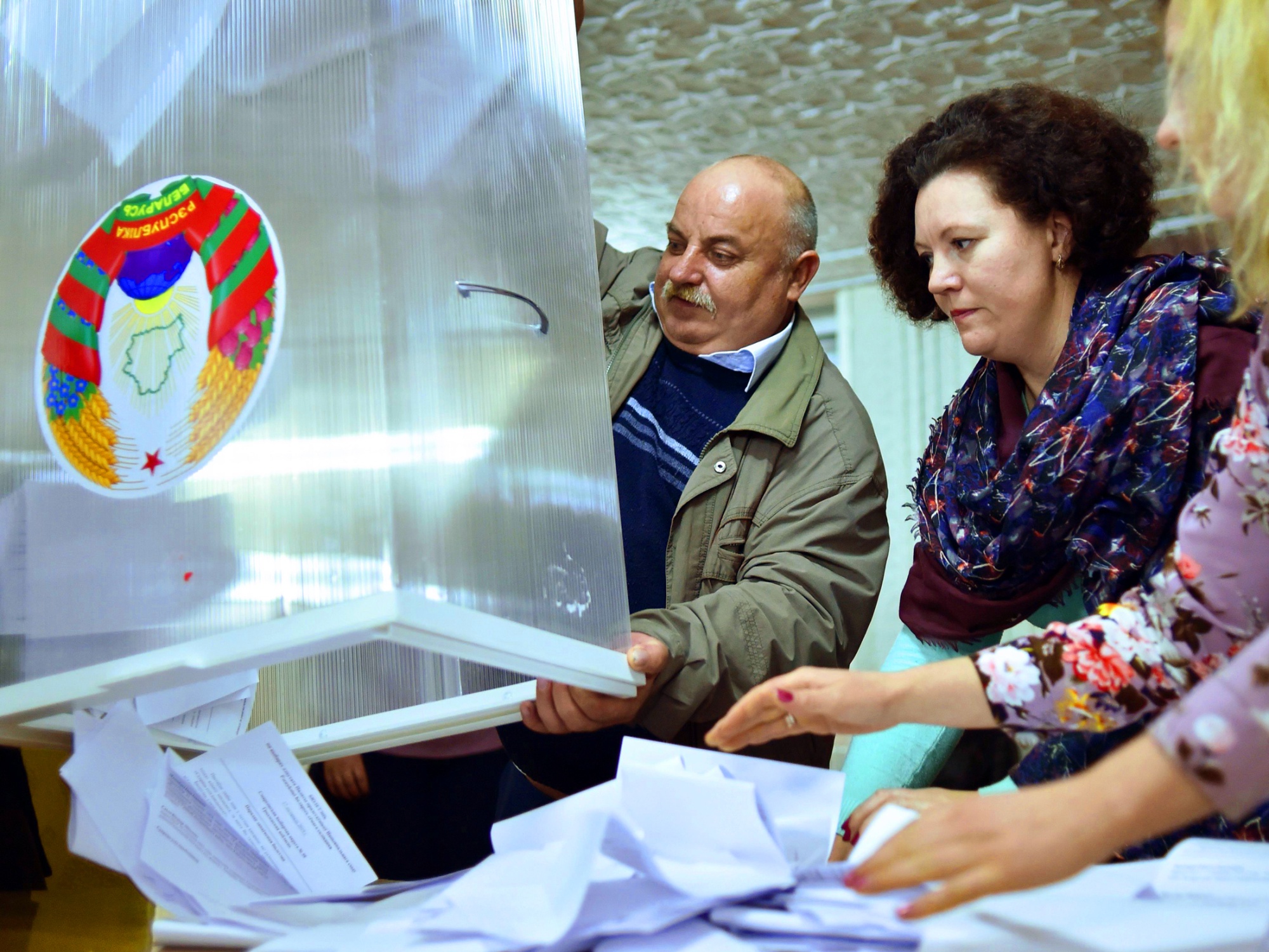 Votes are counted at a polling station in Kreva, near Minsk, Belarus, on Nov. 17.