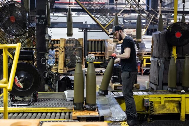 A worker packs projectiles at the Scranton Army Ammunition Plant.