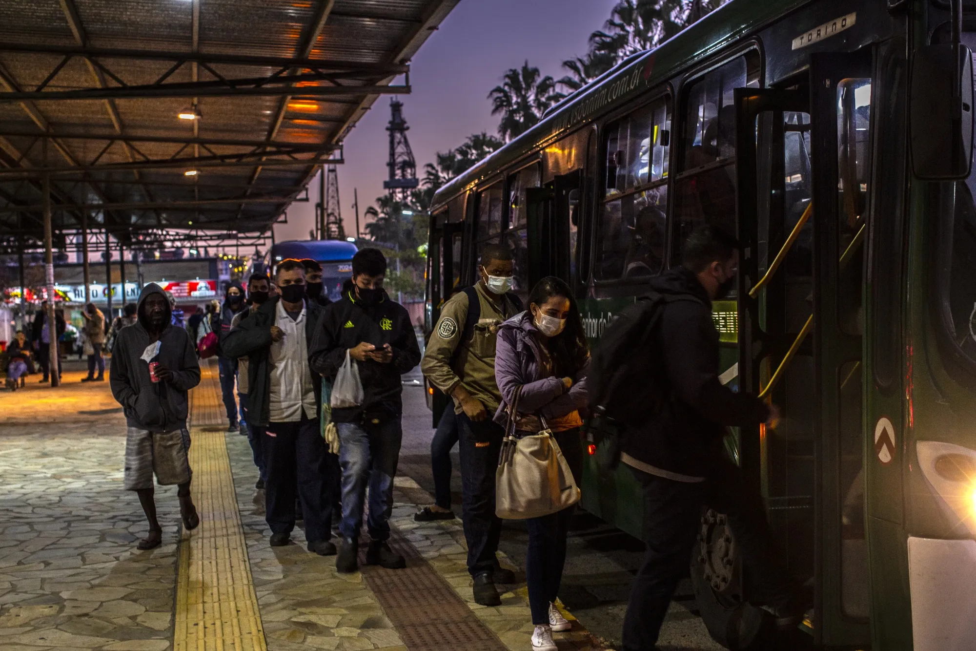 Workers leave their work&nbsp;in Angra dos Reis, Rio de Janeiro state, Brazil in July&nbsp;2021.&nbsp;