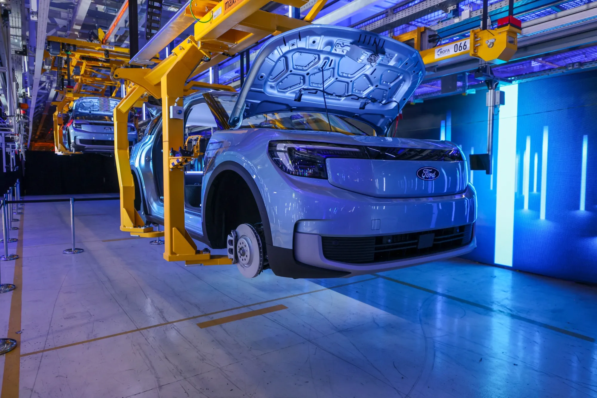 An&nbsp;electric Ford Explorer sports utility vehicle (SUV) on an assembly line in Cologne, Germany, in 2023.