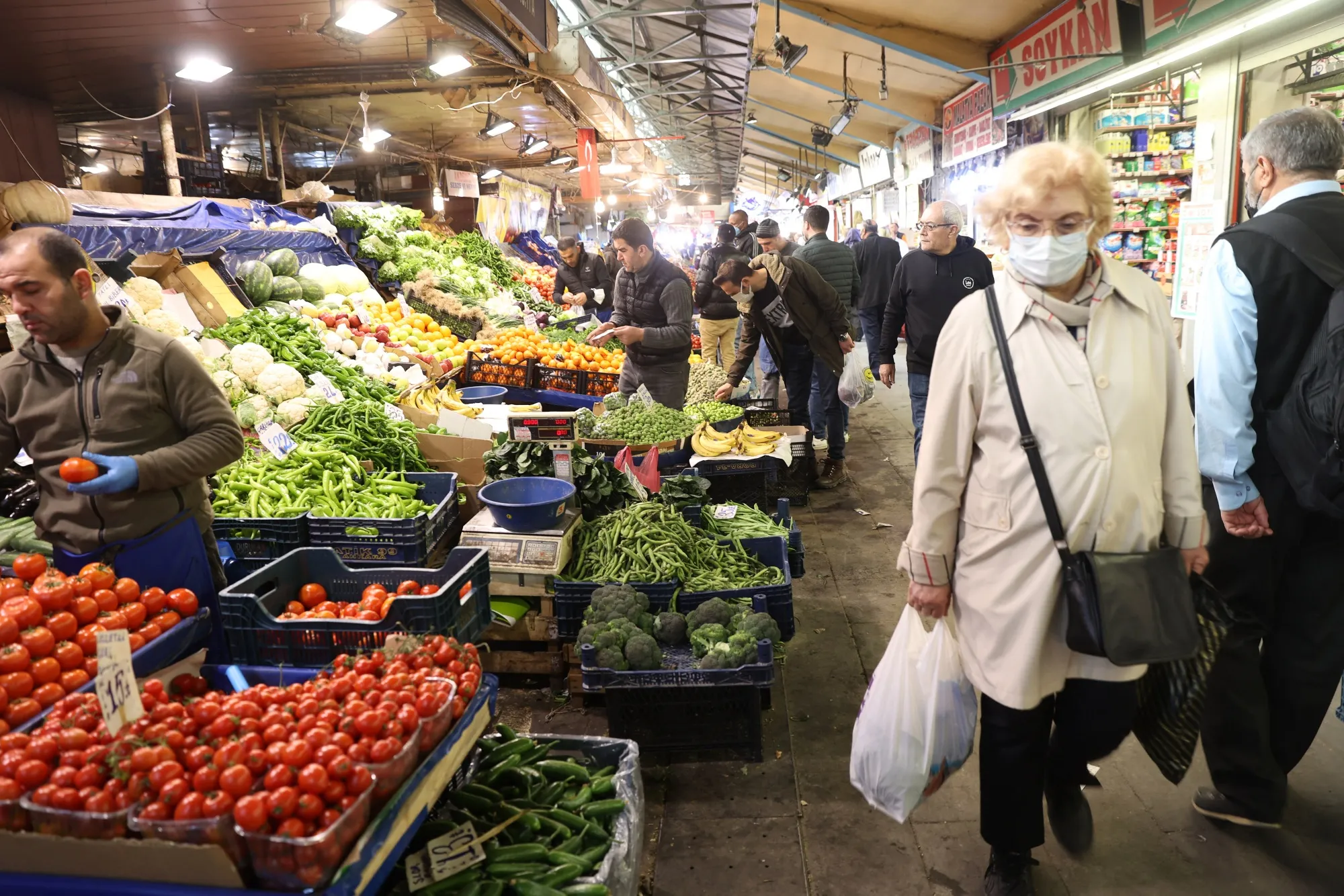 People shop at a vegetable and fruit market in Ankara's historic Ulus district on April 14.