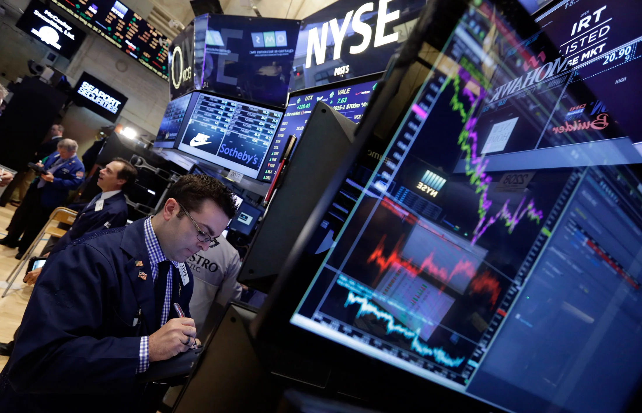Traders on the floor of the New York Stock Exchange.
