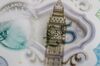 The Elizabeth Tower, also known as Big Ben, and a portrait of Queen Elizabeth II are seen on a British five pound sterling banknote, in this arranged photograph in London, U.K., on Thursday, Oct. 13, 2016. The U.K. currency is getting harder to trade, and to predict, because the nation’s exit from the European Union has changed the rules of engagement.
