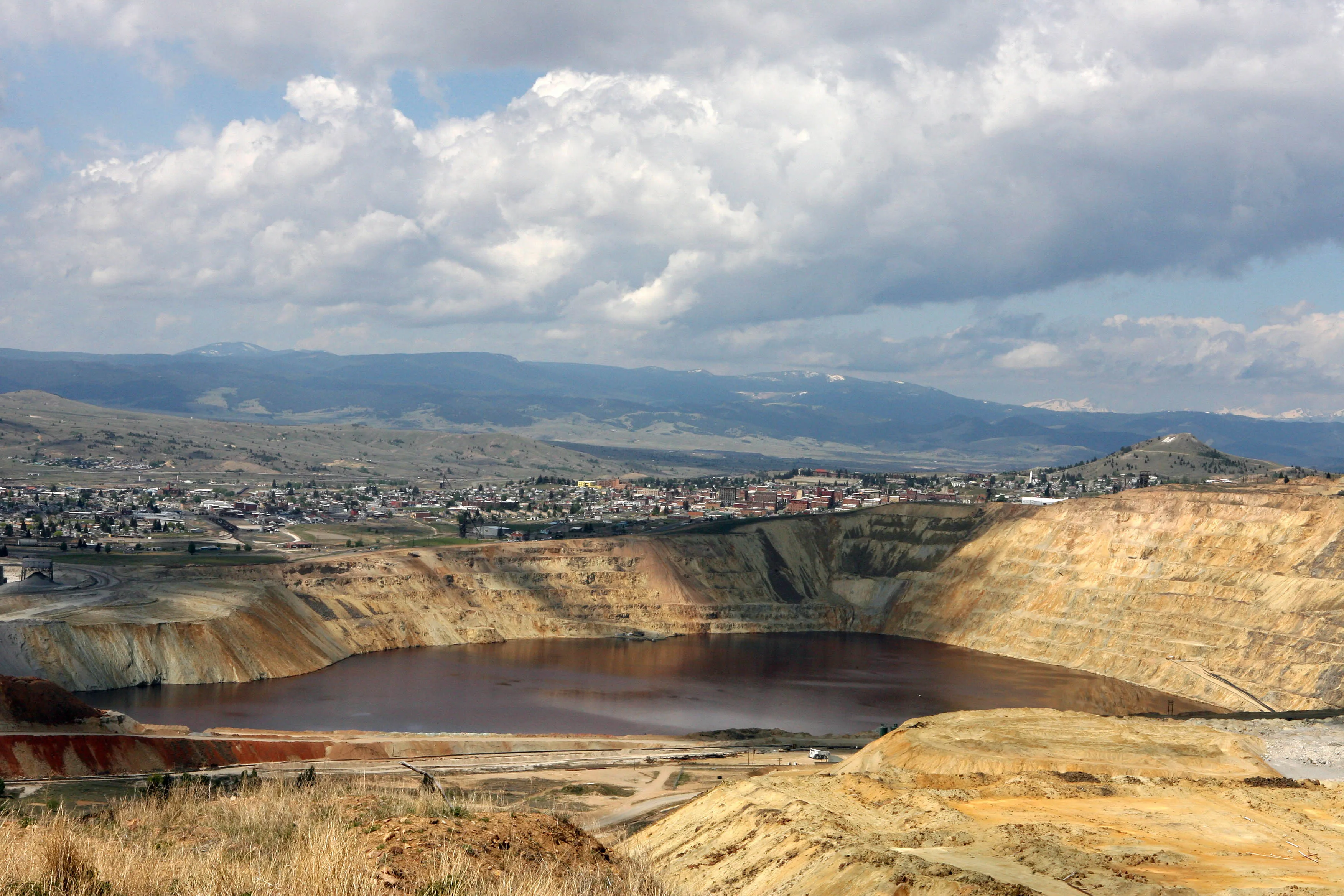 The Berkeley Pit, a former open pit copper mine and a part of a&nbsp;Superfund Site, is seen, in Butte, Montana May 25, 2006.